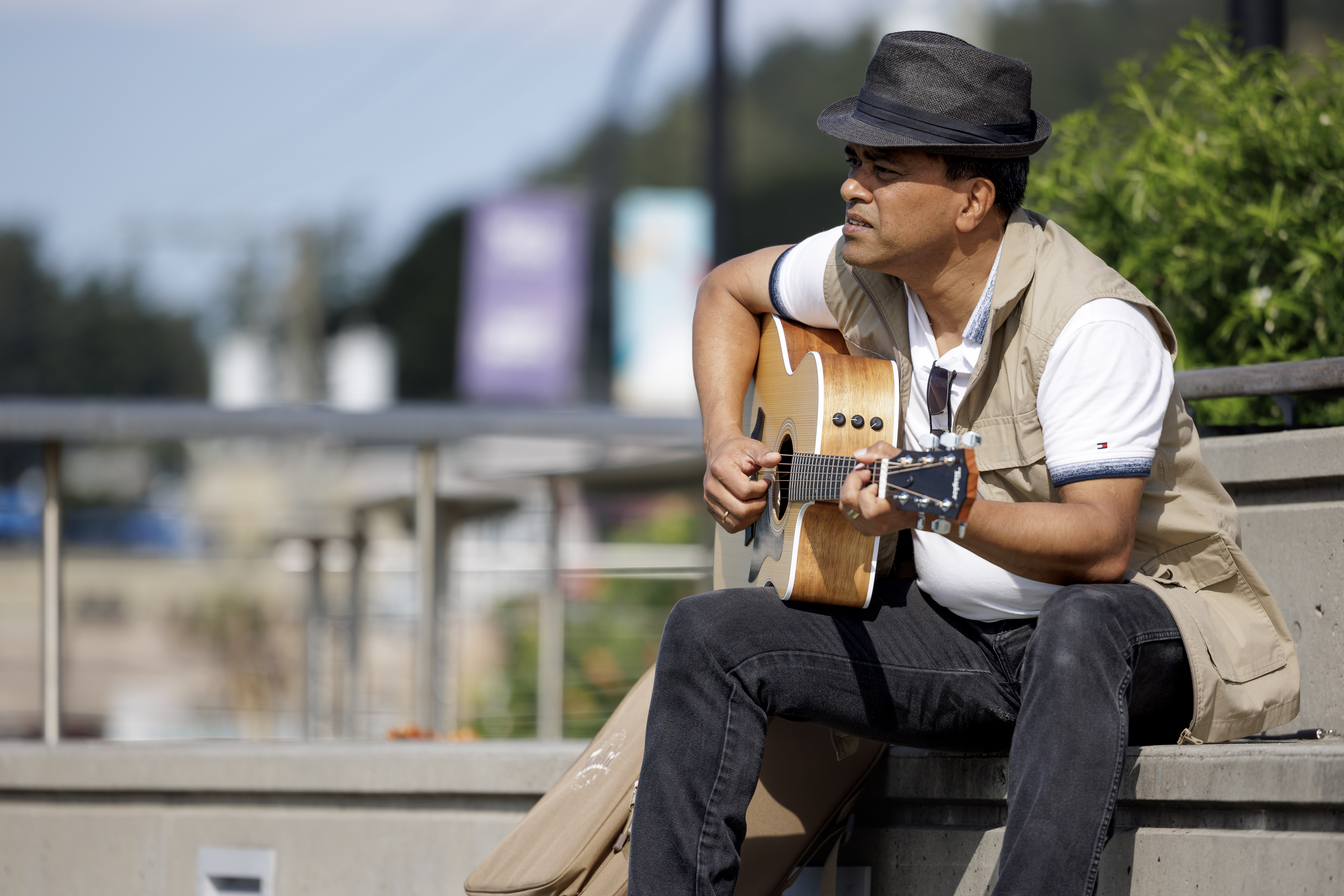 This is an image of a glass panel resulting in a white soundwave graphic when illuminated by a beam of light.